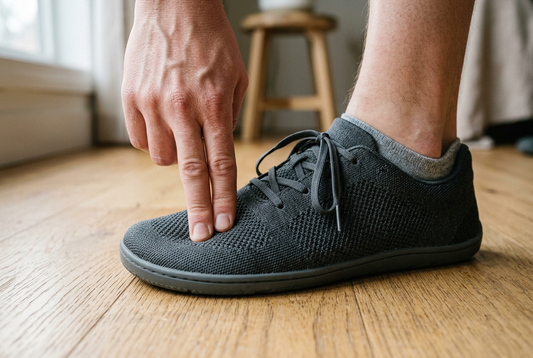 Checking the ball-of-foot fit and upper pressure in a wide-width shoe